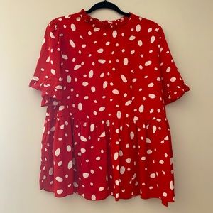 Red and white Dalmatian blouse. Frill collar, empire waist, button neck.